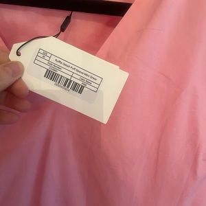 New with tags. Tiny tear near zipper. Please see designers website for sizing